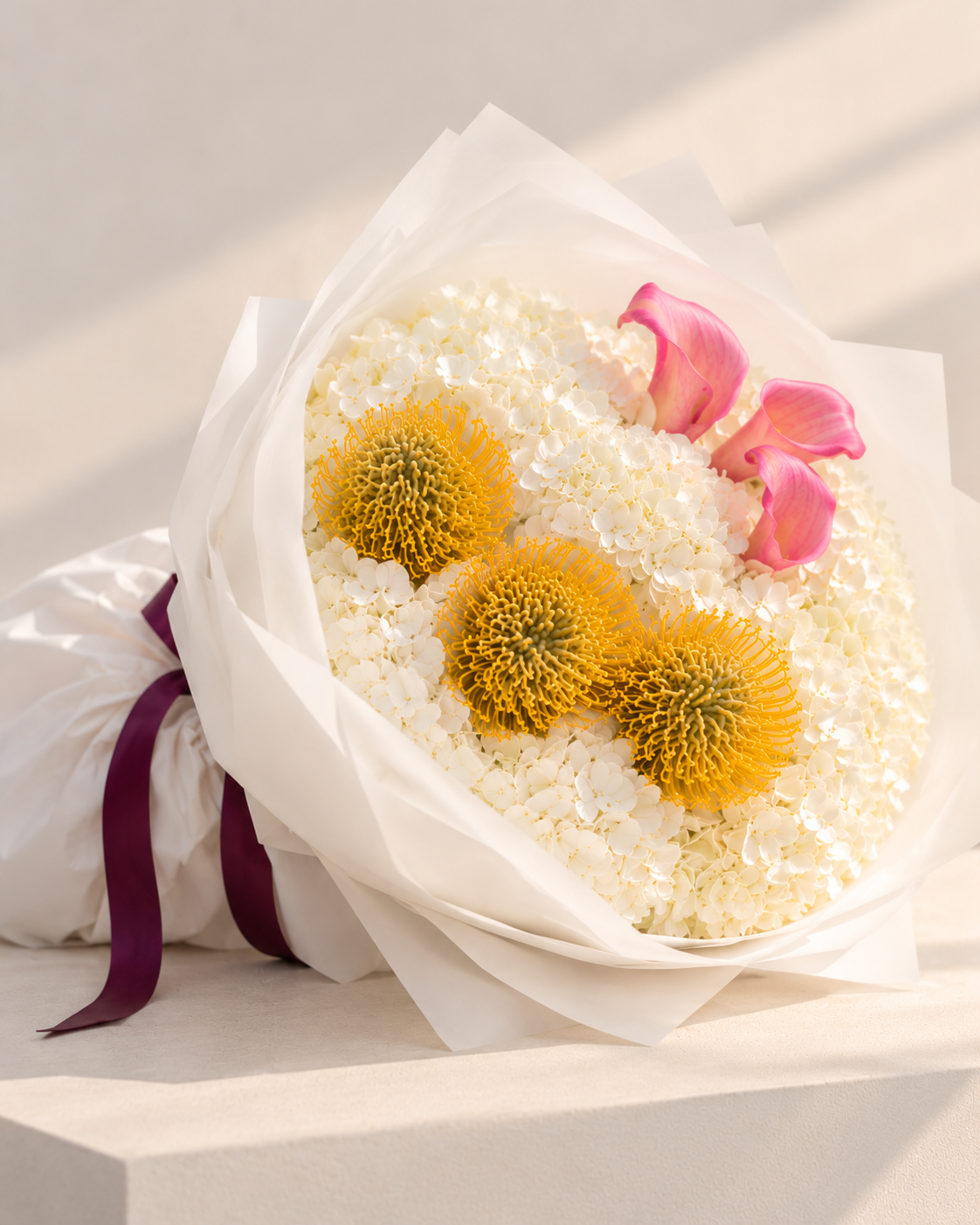 Sunlit Elegance – White Hydrangea & Yellow Leucospermum Bouquet