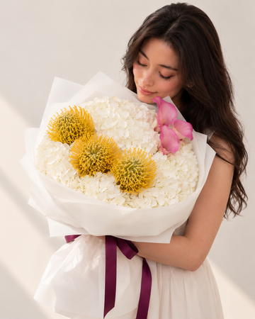 Sunlit Elegance – White Hydrangea & Yellow Leucospermum Bouquet